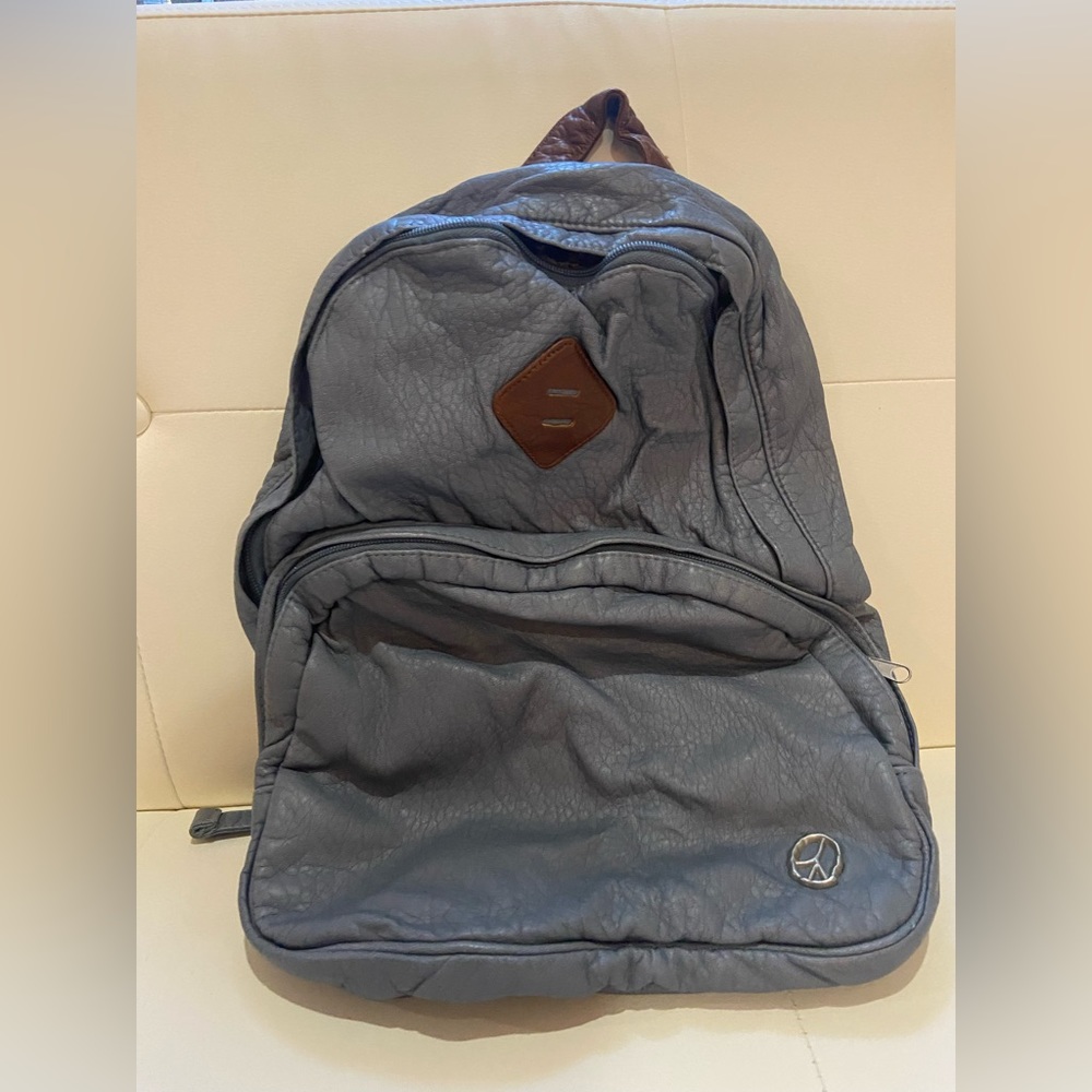 Olsenboye backpack light blue faux leather silver peace sign brown accent floral